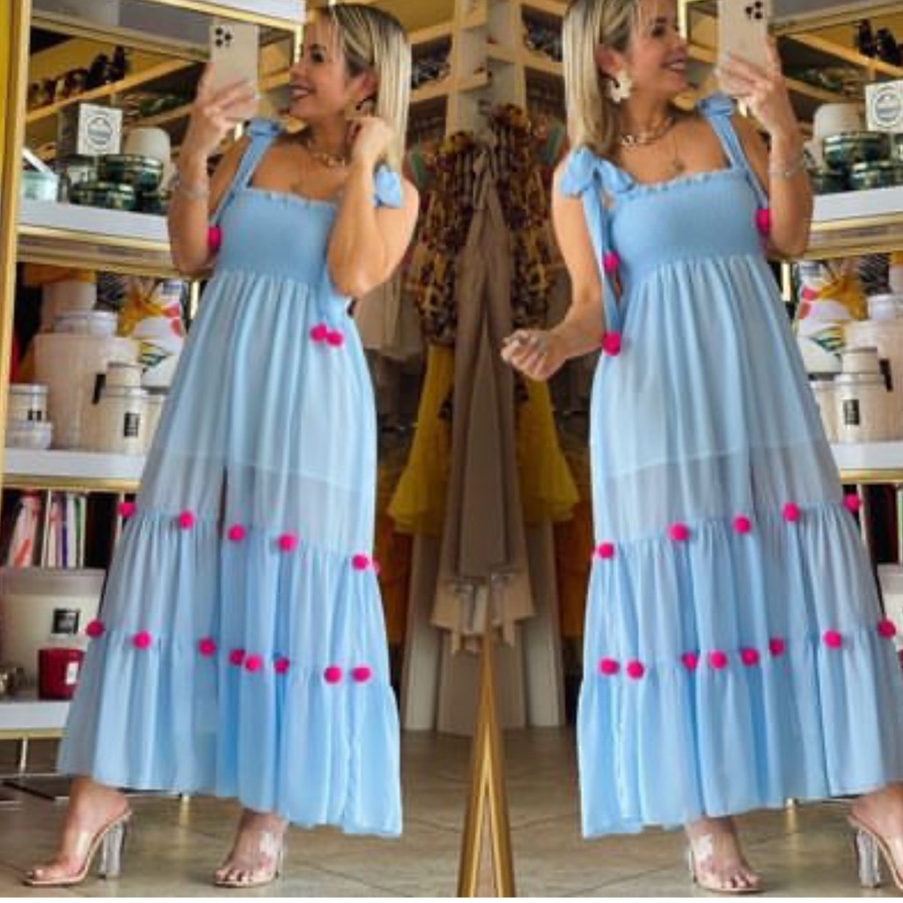 Long baby blue dress size small, with pink pompms. Bought from boutique for $89